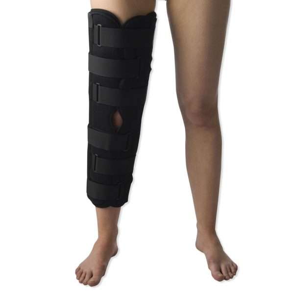 Lady wearing the Deluxe 3 Panel Knee Immobiliser from TalarMade